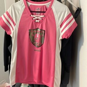 Woman’s raiders jersey top